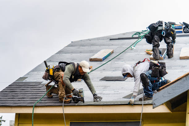 Professional Roofing technician working in Fuquay-Varina, NC
